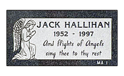 Flat grave marker designed by the Iowa Memorial Granite Company for Hallihan Family. The flat granite marker is set in located in an Iowa cemetery.