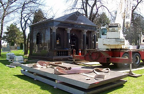 Pieces of granite for mausoleum roof construction.