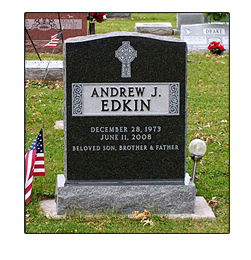 Picture of upright cemetery monument designed by the Iowa Memorial Granite Company of Muscatine, Iowa for the Edkin Family.