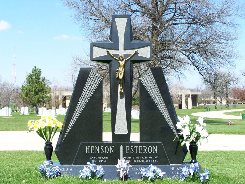 Family monument with bronze Jesus